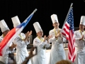 Stefani-clapping-Bradley-holding-flag-TeamUSA_NOLA-533-photocredit_KenGoodman